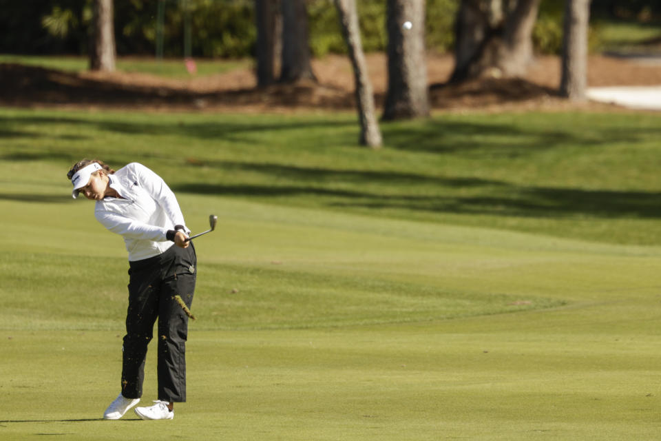 Alexa Pano hits a fairway shot on the seventh hole during the final round of the Hilton Grand Vacations Tournament of Champions LPGA golf tournament in Orlando, Fla., Sunday, Jan. 21, 2024. (AP Photo/Kevin Kolczynski)