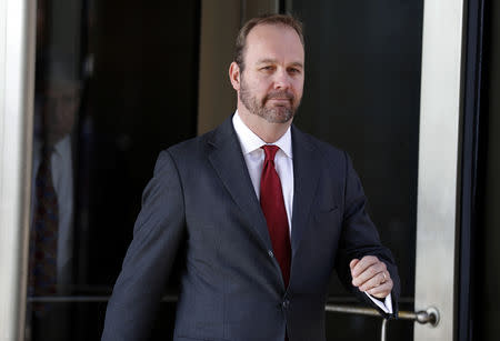 FILE PHOTO: Rick Gates, former campaign aide to U.S. President Donald Trump, departs after a bond hearing at U.S. District Court in Washington, U.S., December 11, 2017. REUTERS/Joshua Roberts/File photo