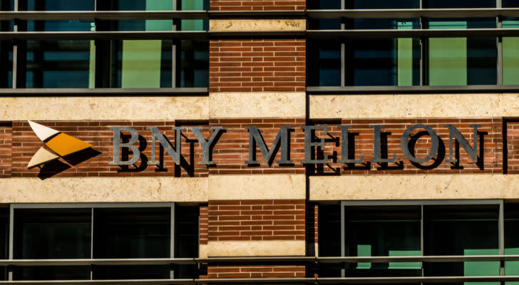 BK stock: Bank of New York Mellon logo on the side of a building