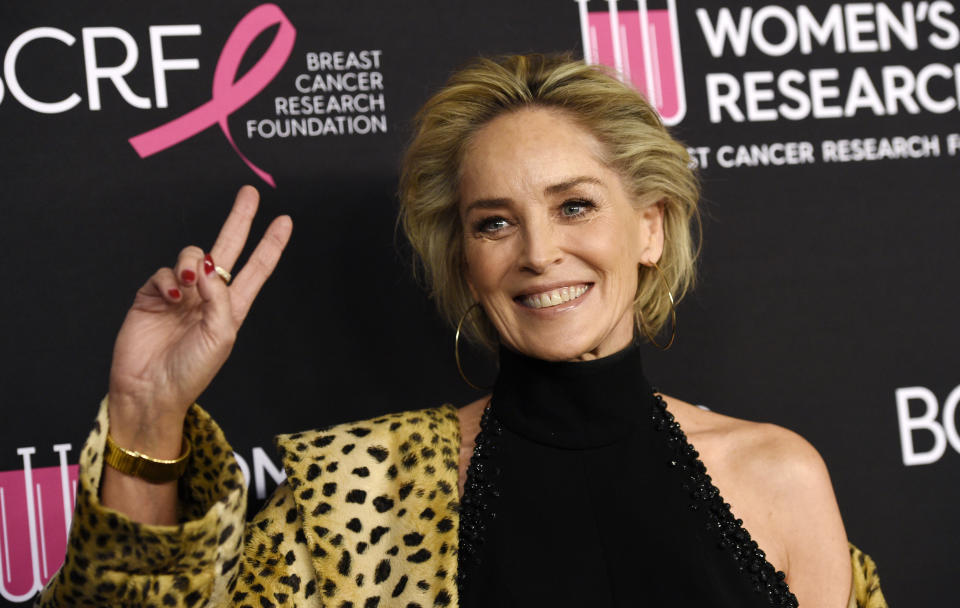 FILE - In this Feb. 28, 2019, file photo, actress Sharon Stone poses at the 2019 "An Unforgettable Evening" benefiting the Women's Cancer Research Fund, at the Beverly Wilshire Hotel in Beverly Hills, Calif. Stone is criticizing the availability of COVID-19 testing in Montana, where her sister and brother-in-law are hospitalized with the respiratory virus. Stone posted a video on Instagram Sunday expressing frustration that there aren't enough tests for front-line workers and people who have had direct contact with someone who has COVID-19. (Photo by Chris Pizzello/Invision/AP, File)