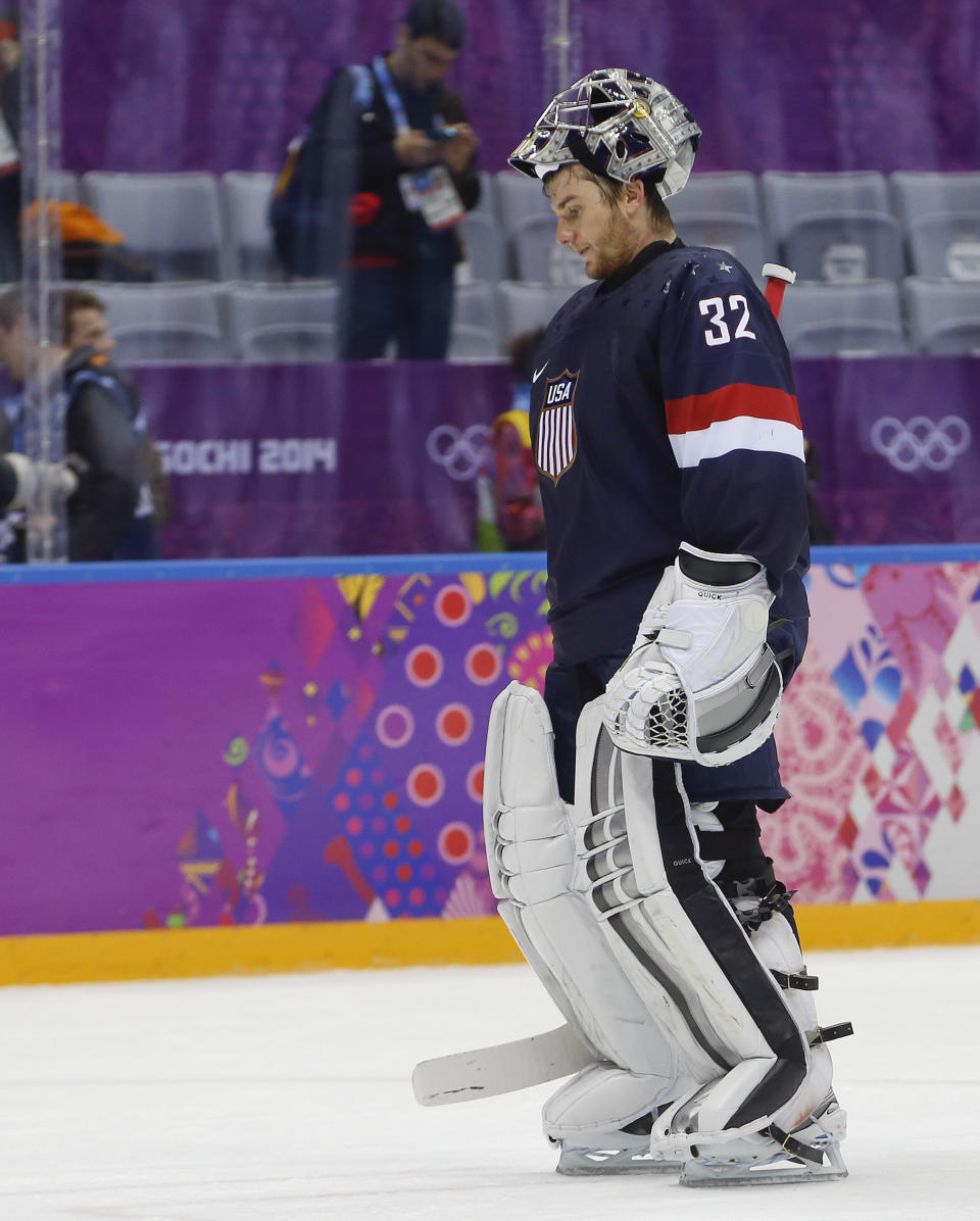 USA goaltender Jonathan Quick skates off the ice after Finland beat the USA 5-0 in the men's bronze medal ice hockey game at the 2014 Winter Olympics, Saturday, Feb. 22, 2014, in Sochi, Russia. (AP Photo/Petr David Josek)