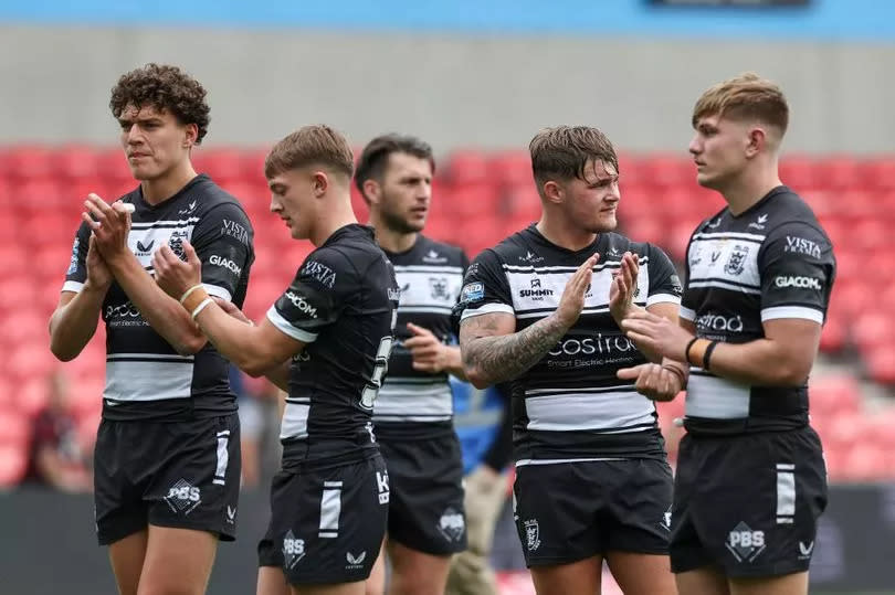 Will Kirby (far right) thanks Hull FC's fans for their support after his first-team debut.