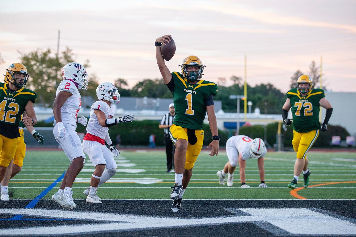 RBC's quarterback Frankie Williams scores a touchdown during the first half of the Wall Township Crimson Knights vs. Red Bank Catholic Caseys high school football game at Count Basie Park in Red Bank, NJ Friday, September 15, 2023.