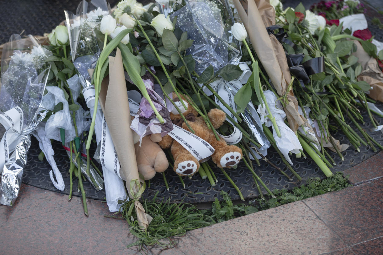 Flowers and stuffed toys lie at a makeshift shrine to commemorate victims in Belgrade, Serbia, Thursday, May 4, 2023. A 13-year-old opened fire Wednesday at his school in Serbia's capital, killing eight fellow students and a guard before calling the police and being arrested. Six children and a teacher were also hospitalized. (AP Photo/Marko Drobnjakovic)