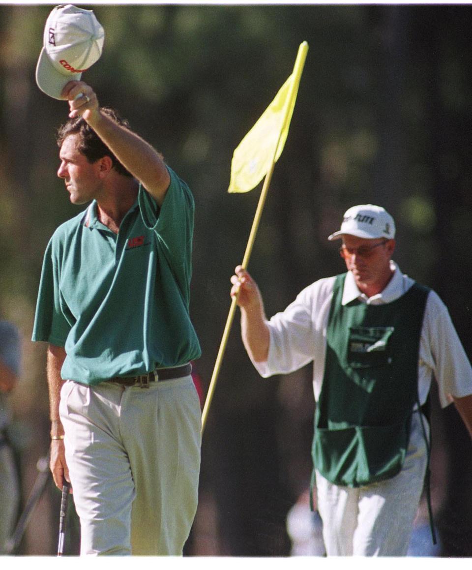 3/29/98--Stuart Tannehill/staff--Len Mattiace lifts his hat to the crowd before falling apart on 17.