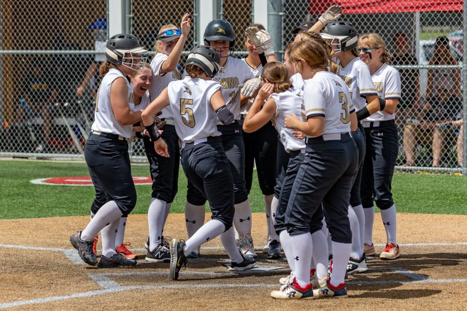 Sophia Polzella rounds the bases after putting one over the fence for a three run homer putting the Corning Hawks up 6-0 over Maine Endwell in the top of the 3rd inning of the STAC championship softball game.