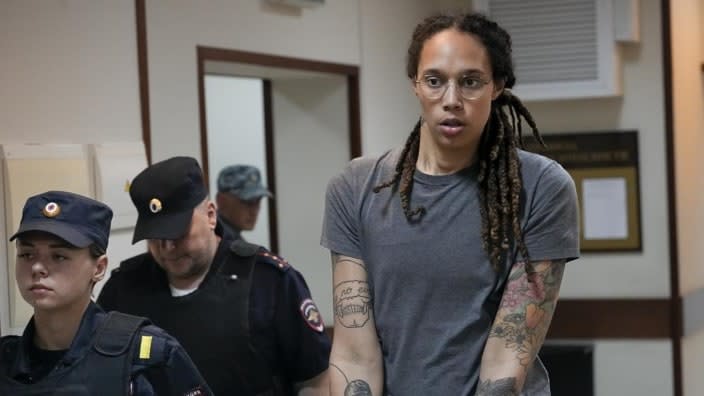 WNBA star and two-time Olympic gold medalist Brittney Griner is escorted from a court room after an August hearing in Khimki, just outside Moscow, Russia. (Photo: Alexander Zemlianichenko/AP, File)