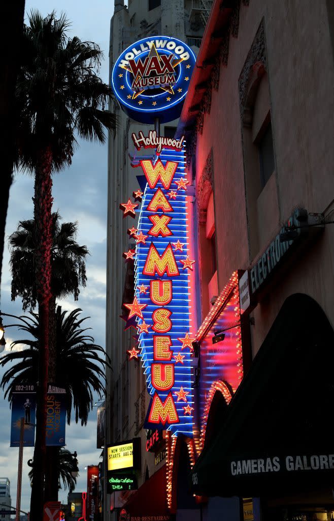 <p>Flashing bulbs illuminate the sign at the Hollywood Wax Museum on Hollywood Boulevard. The iconic museum has been a Hollywood staple since 1965.</p>