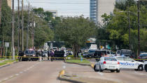 <p>Investigators looks over the scene where nine individuals were shot at a strip mall along Weslayan St. on September 26, 2016 in Houston, Texas. ( Bob Levey/Getty Images) </p>