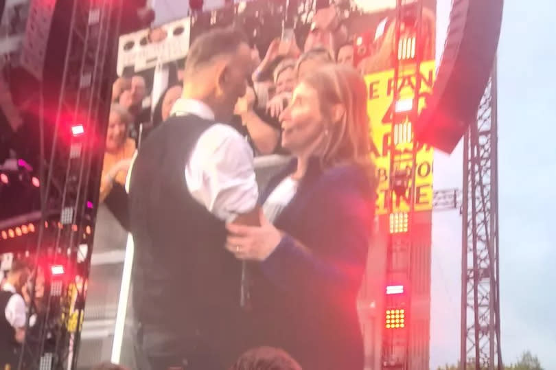 One lucky fan got to dance with her idol at the Belfast show