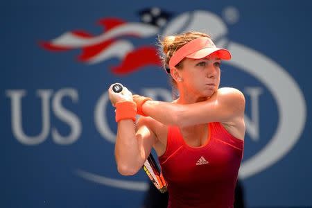 Sep 3, 2015; New York, NY, USA; Simona Halep of Romania hits to Kateryna Bondarenko of Ukraine on day four of the 2015 U.S. Open tennis tournament at USTA Billie Jean King National Tennis Center. Mandatory Credit: Robert Deutsch-USA TODAY Sports