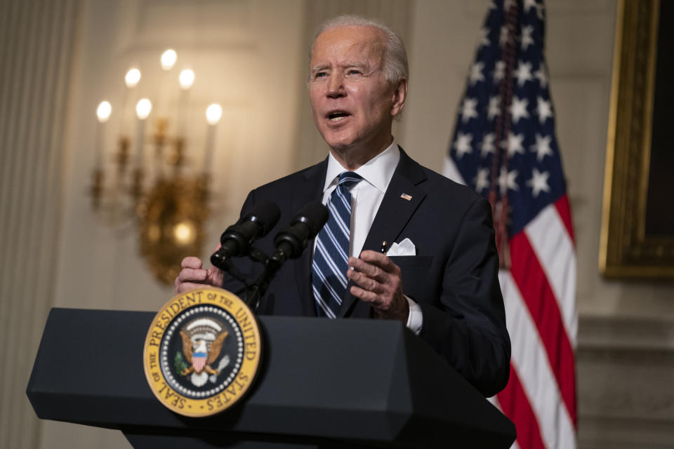 President Joe Biden delivers remarks on climate change and green jobs, in the State Dining Room of the White House, Wednesday, Jan. 27, 2021, in Washington. (AP Photo/Evan Vucci)