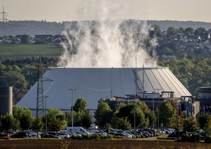 FILE - Smoke rises from the nuclear power plant of Nerckarwestheim in Neckarwestheim, Germany, on Aug. 22, 2022. Europe is staring an energy crisis in the face. The cause: Russia throttling back supplies of natural gas. European officials say it's a pressure game over their support for Ukraine after Russia's invasion. (AP Photo/Michael Probst, File)