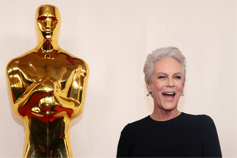 Jamie Lee Curtis poses on the red carpet during the Oscars arrivals (REUTERS)