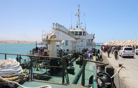 Maritime police are seen aboard oil tanker Aris-13, which was released by pirates, as it sails to dock on the shores of the Gulf of Aden in the city of Bosasso, northern Somalia's semi-autonomous region of Puntland, March 19, 2017. REUTERS/Abdiqani Hassan FOR EDITORIAL USE ONLY. NO RESALES. NO ARCHIVES