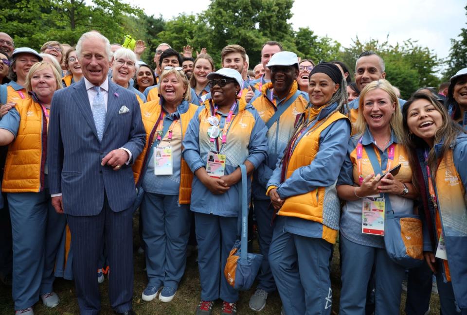 Commonwealth volunteers meet the Prince of Wales on the day of the opening ceremony (Phil Noble/PA) (PA Wire)