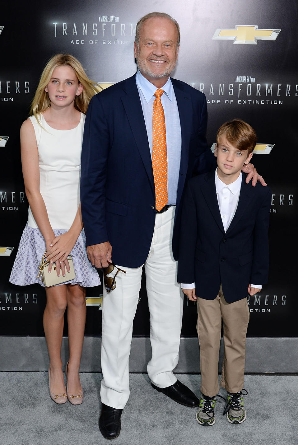 <p>Grammer — who plays a corrupt government agent in <em>Age of Extinction</em> — brings along children Jude and Mason to the New York premiere. (Photo: Dimitrios Kambouris/Getty Images) </p>
