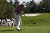 Cameron Smith, of Australia, tees off on the fifth hole during the final round at the Masters golf tournament on Sunday, April 10, 2022, in Augusta, Ga. (AP Photo/Matt Slocum)