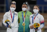 From left, Mykayla Skinner of the United States, Rebeca Andrade of Brazil and Yeo Seo-jeong of South Korea, pose with their medals for the vault during the artistic gymnastics women's apparatus final at the 2020 Summer Olympics, Sunday, Aug. 1, 2021, in Tokyo, Japan. (AP Photo/Natacha Pisarenko)