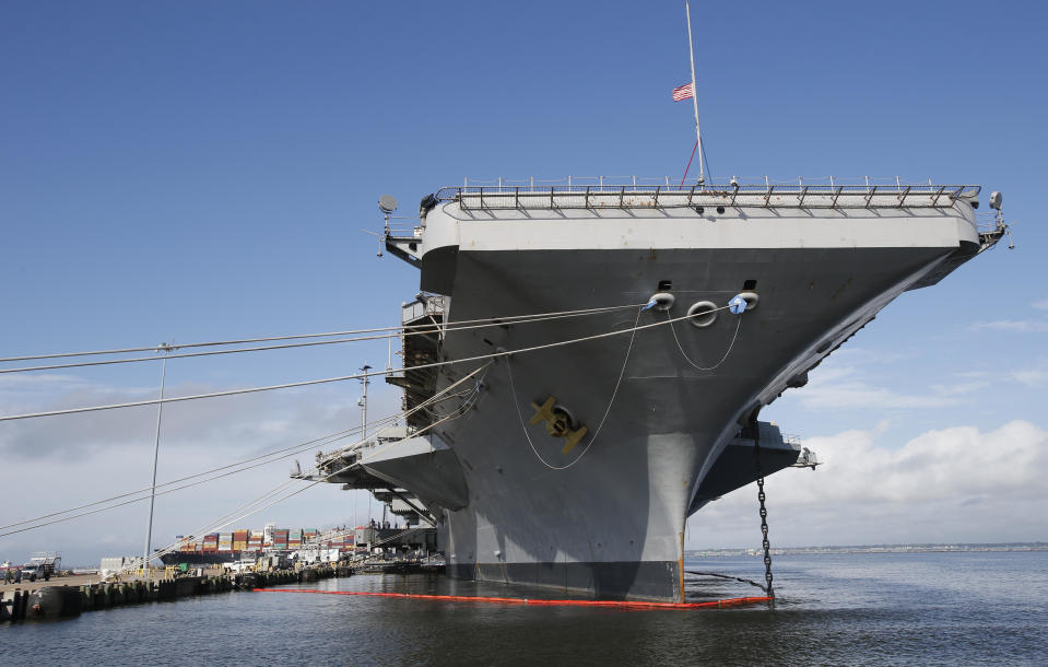 The nuclear aircraft carrier USS George Washington pier side at Norfolk Naval Station in Norfolk, Va., Sept. 30, 2016.  / Credit: Steve Helber / AP