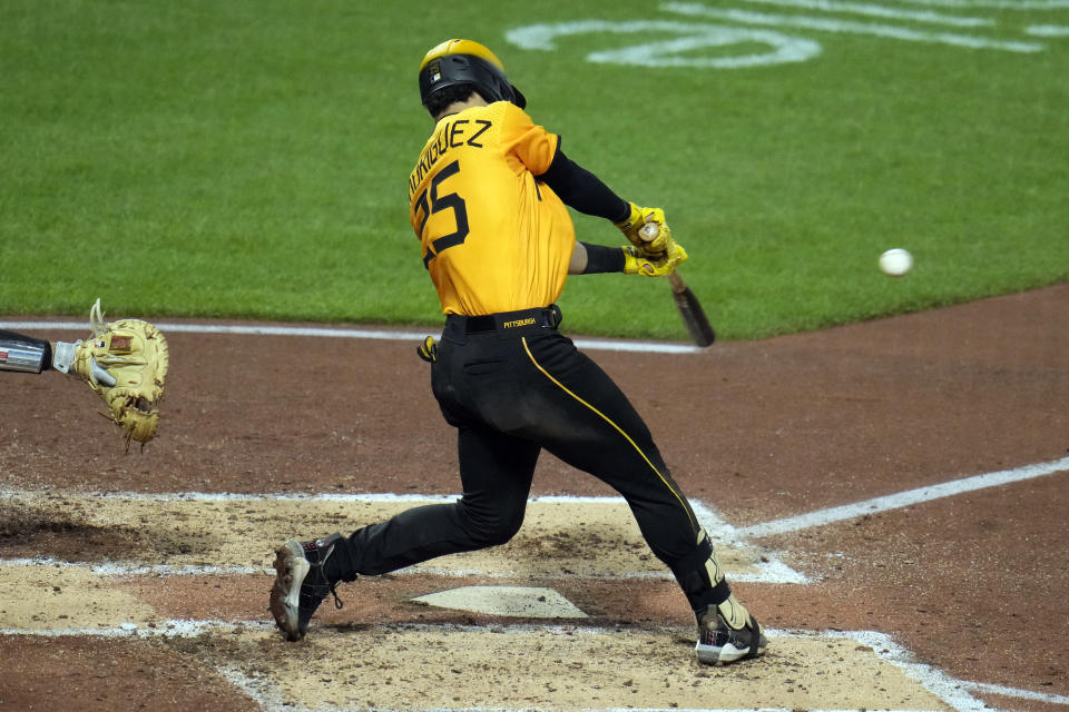 Pittsburgh Pirates' Endy Rodriguez singles off Miami Marlins starting pitcher Edward Cabrera, driving in a run, during the fourth inning of a baseball game in Pittsburgh, Friday, Sept. 29, 2023. (AP Photo/Gene J. Puskar)