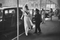 Caption from LIFE. "The Countess Edwina, wife of Earl Mountbatten, is helped from her car." (Frank Scherschel—Time & Life Pictures/Getty Images) <br> <br> <a href="http://life.time.com/history/queen-elizabeth-and-prince-philip-photos-from-the-royal-wedding-1947/#1" rel="nofollow noopener" target="_blank" data-ylk="slk:Click here to see the full collection at LIFE.com;elm:context_link;itc:0;sec:content-canvas" class="link ">Click here to see the full collection at LIFE.com</a>