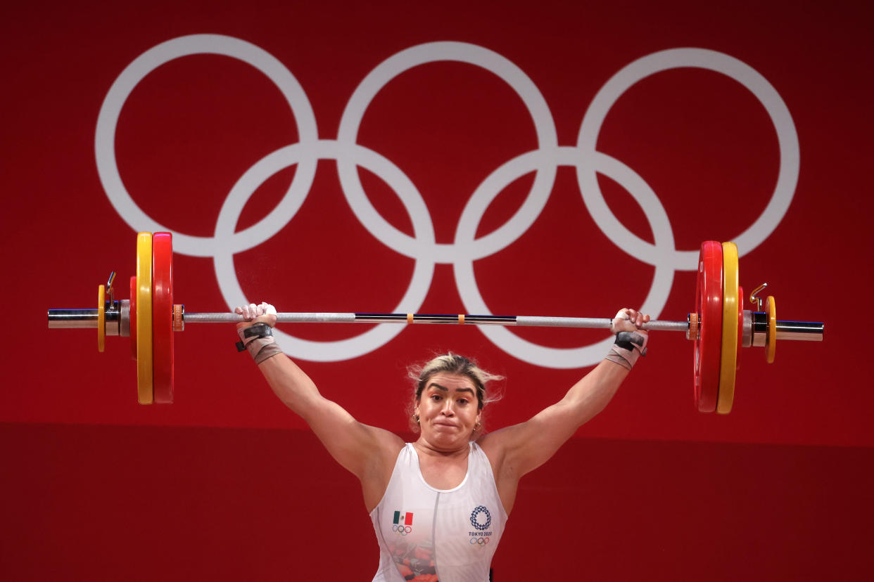TOKYO, JAPAN - AUGUST 01: Aremi Fuentes Zavala of Team Mexico competes during the Weightlifting - Women's 76kg Group A on day nine of the Tokyo 2020 Olympic Games at Tokyo International Forum on August 01, 2021 in Tokyo, Japan. (Photo by Chris Graythen/Getty Images)