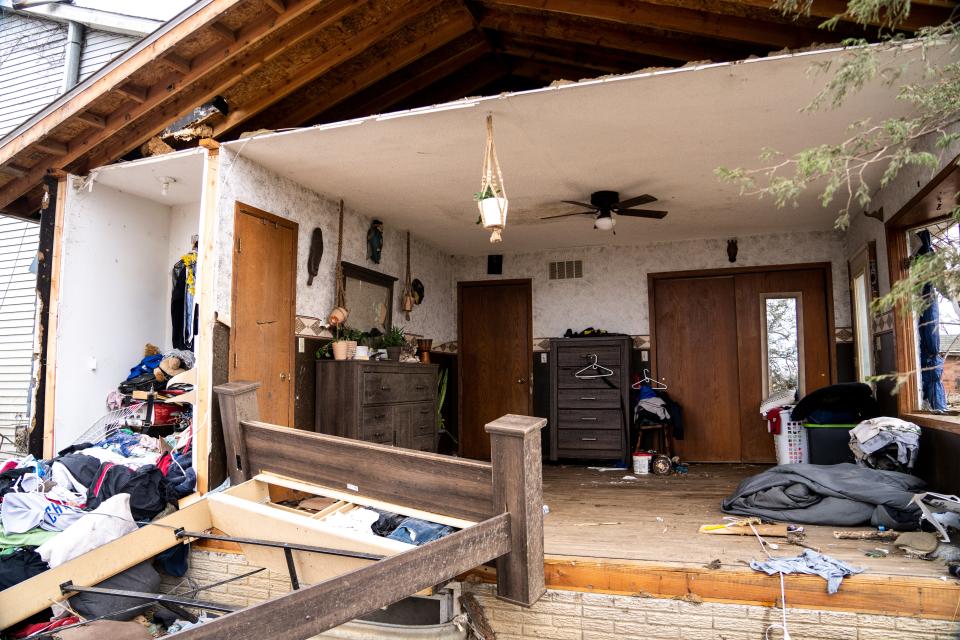 Daniel and Norma Ginger's bedroom after a wall was torn out on Wednesday, April 5, 2023, the day after a tornado outside Pleasantville, Iowa.