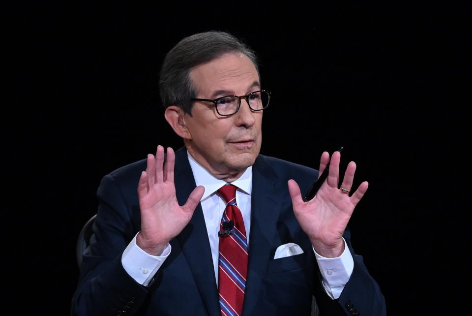 Moderator Chris Wallace of Fox News speaks as President Donald Trump and Democratic presidential candidate former Vice President Joe Biden participate in the first presidential debate Tuesday, Sept. 29, 2020, at Case Western University and Cleveland Clinic, in Cleveland. (Olivier Douliery/Pool vi AP)