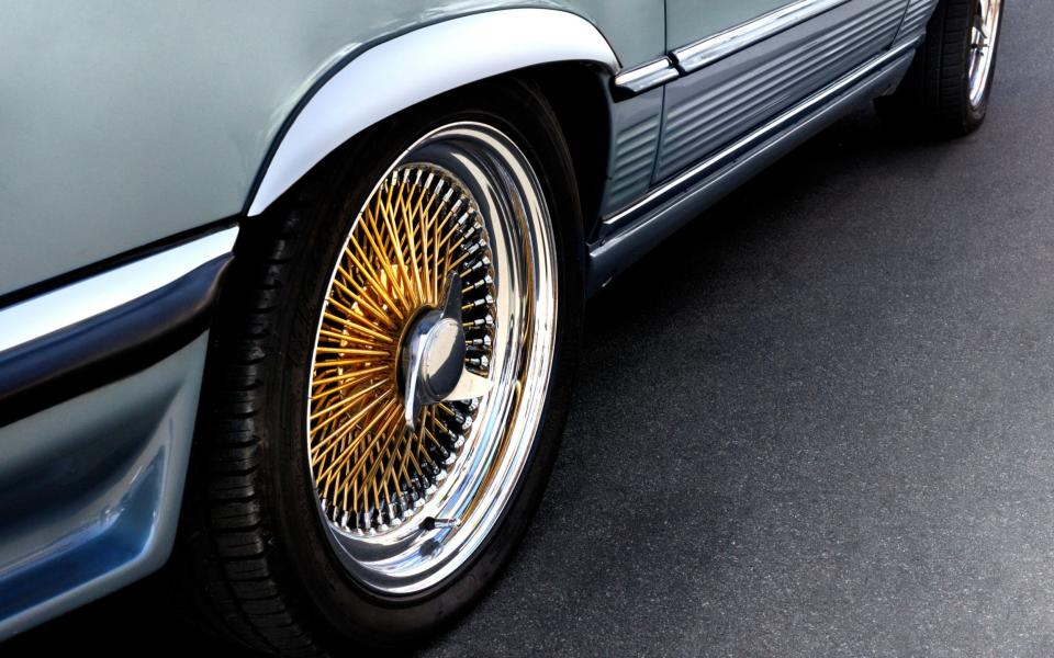 Classic car wheels and shiny rims. Image shot 2007. Exact date unknown. - Alamy 