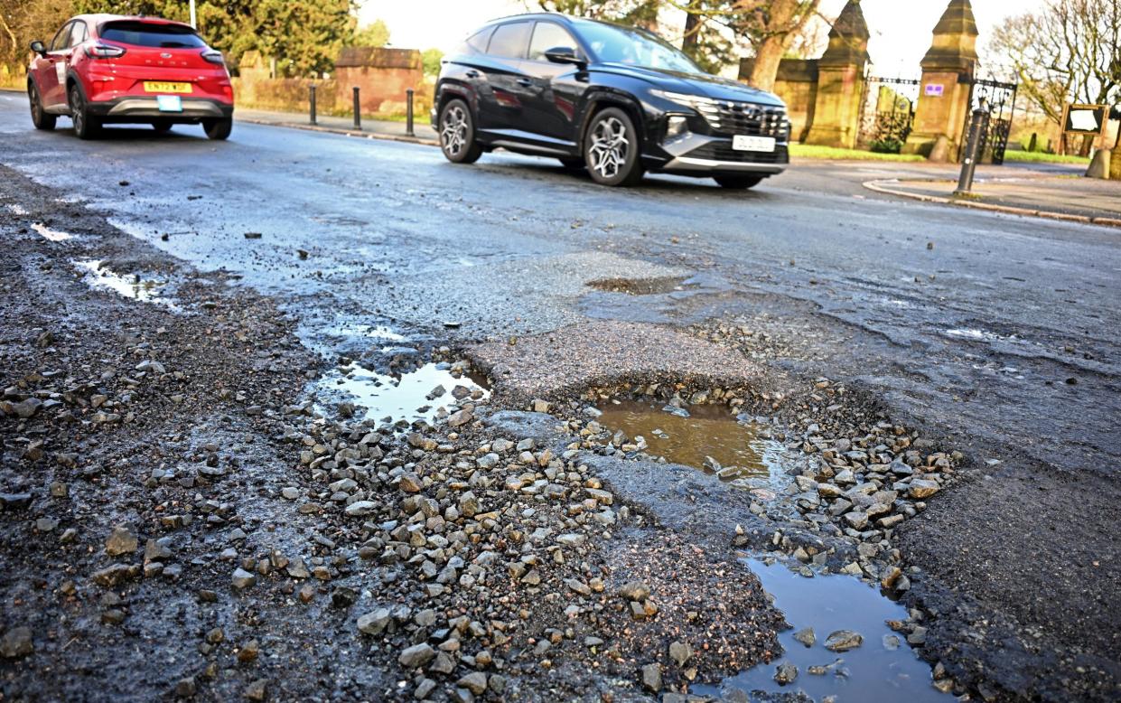 Potholes on a road in Liverpool