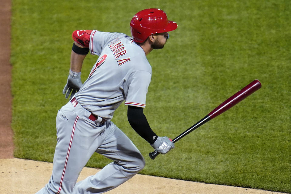 Cincinnati Reds' Albert Almora Jr. heads to first with an RBI single off Pittsburgh Pirates relief pitcher Wil Crowe during the seventh inning of a baseball game in Pittsburgh, Saturday, May 14, 2022. (AP Photo/Gene J. Puskar)