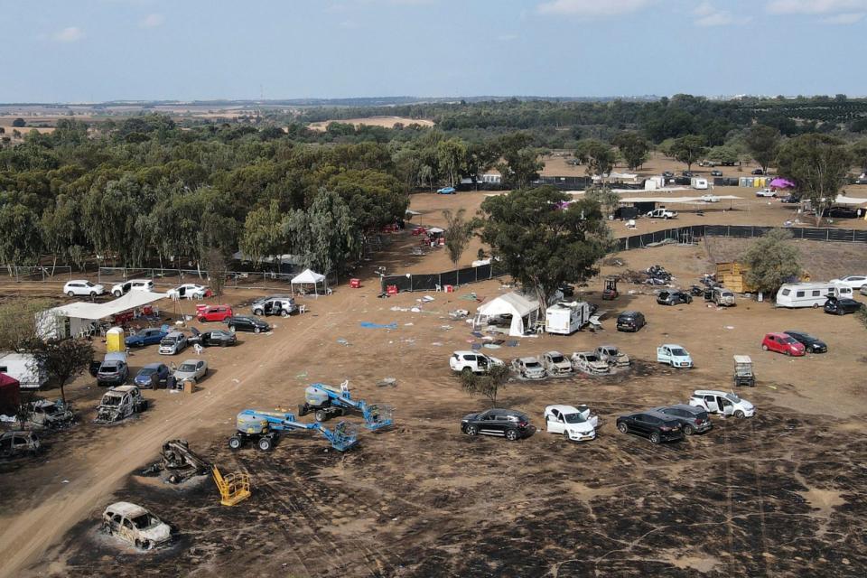 PHOTO: An aerial picture shows the abandoned site of the weekend attack on the Supernova desert music Festival by Palestinian militants near Kibbutz Reim in the Negev desert in southern Israel on Oct. 10, 2023. (Jack Guez/AFP via Getty Images)