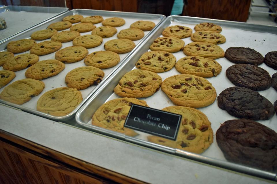 Freshly baked chocolate chip, pecan chocolate chip and chocolate chocolate chip cookies line the case at Cookies, etc. at North Grand Mall in Ames. A Cookie ATM will be installed outside the mall this week so customers have 24/7 access to treats.