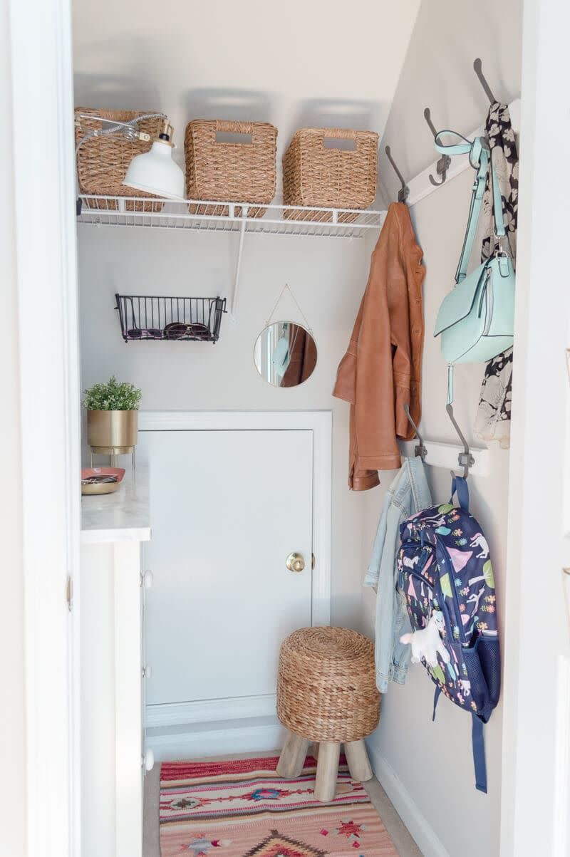 under stair closet with various storage solutions
