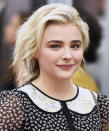 <p>When you wanted an effortless look in the '90s, you didn't style your hair in beachy waves. You gave the front piece at your crown a little flip to the side as demonstrated by Chloë Grace Moretz. </p>