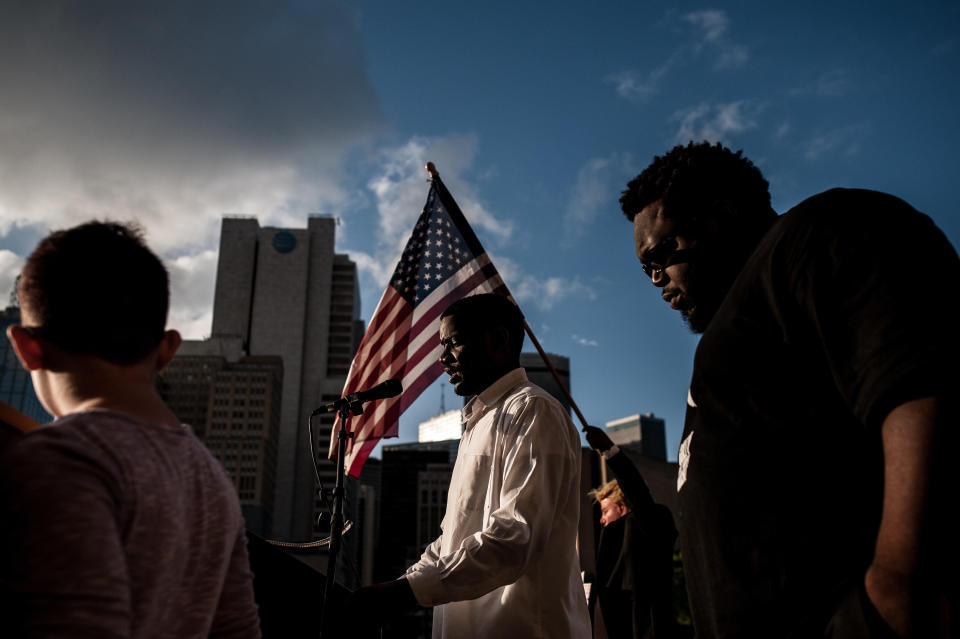 A speaker addresses the crowd at the Dallas Stands Against the NRA rally on&nbsp;Friday near the&nbsp;association's&nbsp;annual meeting.