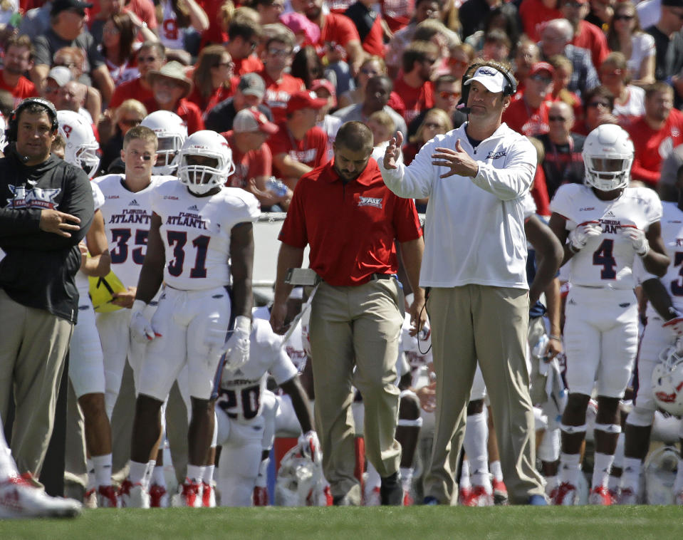 Florida Atlantic head coach Lane Kiffin looks up from the sidelines during an NCAA college football game against Wisconsin Saturday, Sept. 9, 2017 in Madison, Wis. (AP Photo/Aaron Gash)