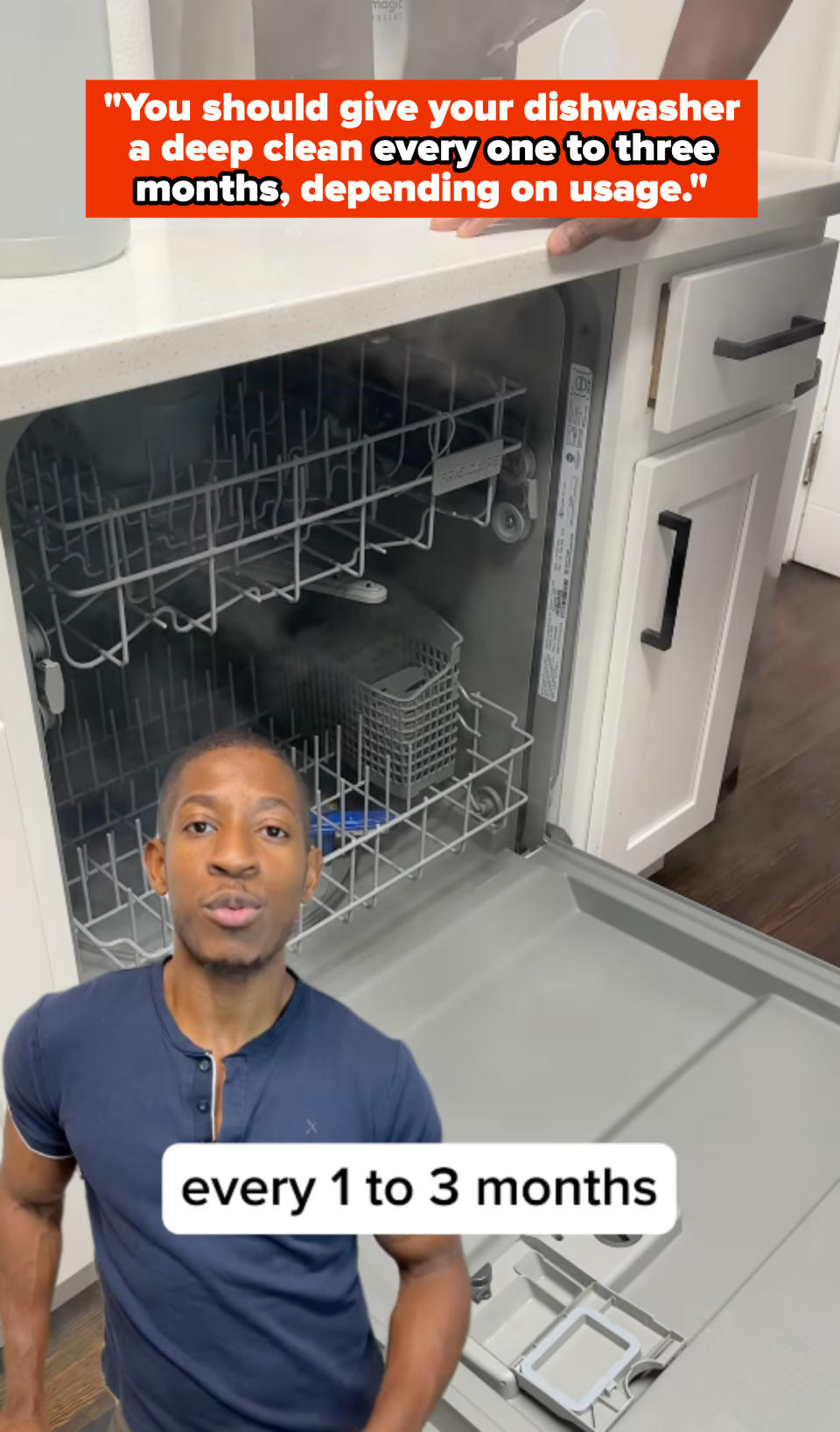 Kyshawn in kitchen standing near open dishwasher, text overlay: "You should give your dishwasher a deep clean every one to three months, depending on usage"