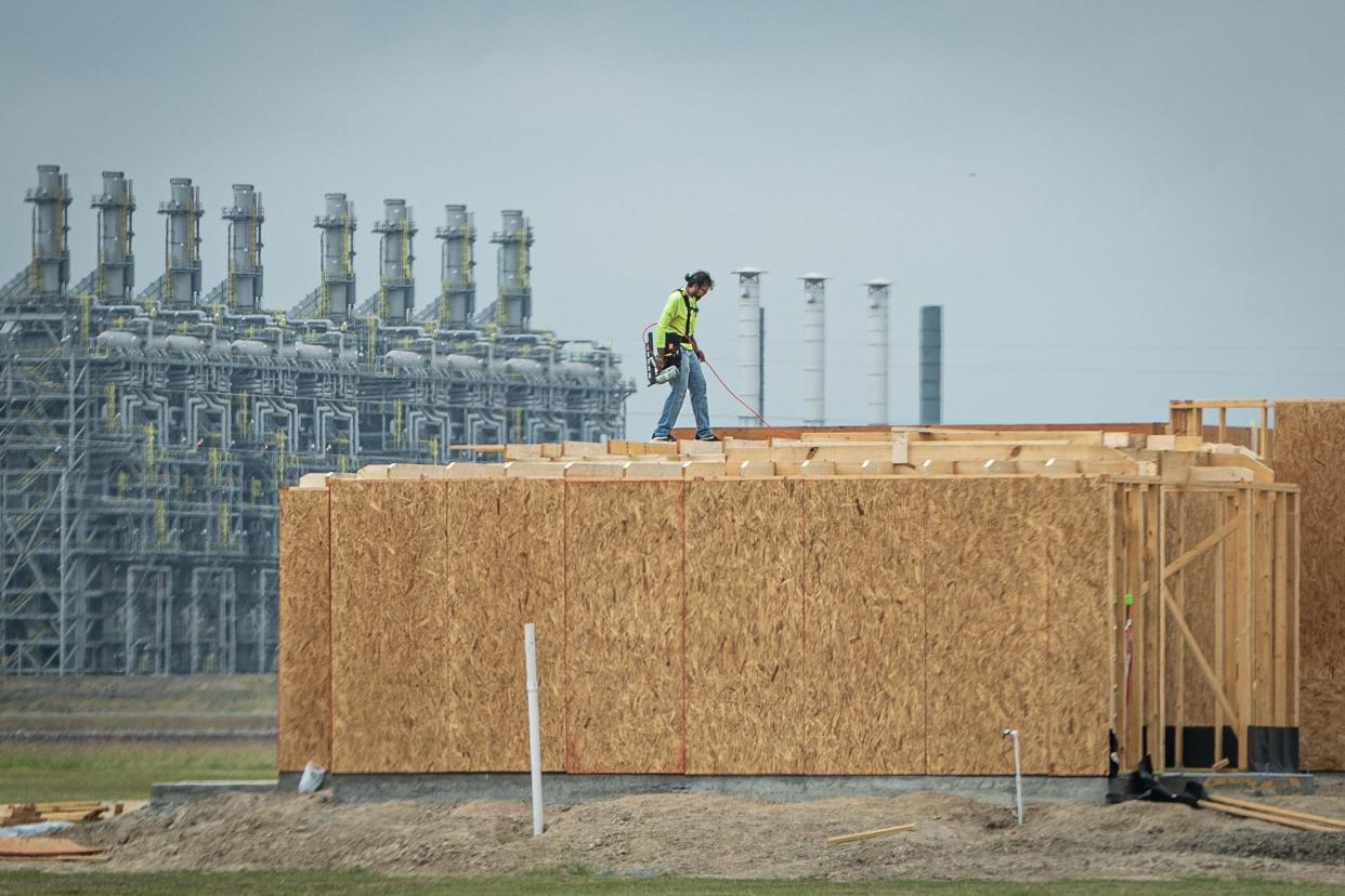 New housing is constructed near Gulf Coast Growth Ventures, an ethylene cracker plant, on April 30, 2022, in San Patricio County, Texas.