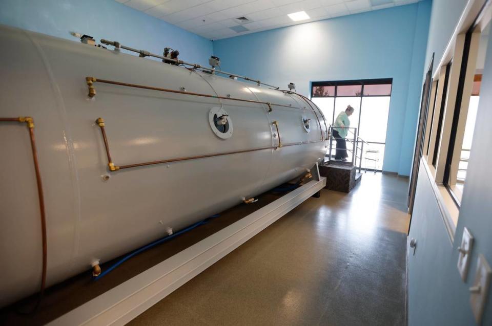 Patients head out after a hyperbaric oxygen therapy session at Extivita in Durham, N.C., on Sept. 22, 2022.