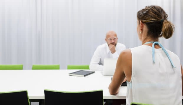 Man and woman at business meeting