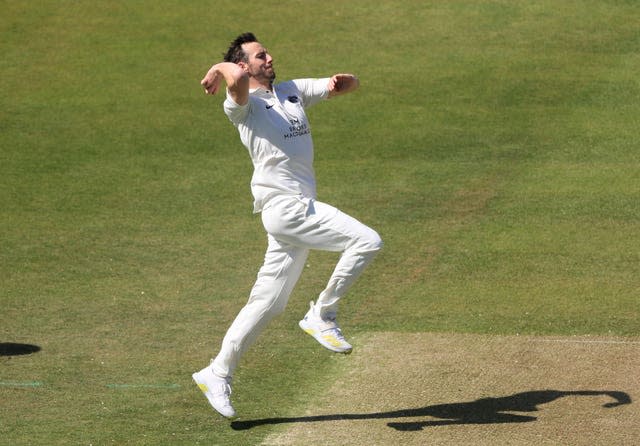 Toby Roland-Jones in bowling action