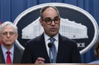 Assistant Attorney General Jonathan Kanter of the Justice Department's Antitrust Division speaks during a news conference at the Department of Justice headquarters in Washington, Thursday, May 23, 2024. The Justice Department has filed a sweeping antitrust lawsuit against Ticketmaster and parent company Live Nation Entertainment, accusing them of running an illegal monopoly over live events in America and driving up prices for fans. The lawsuit was filed Thursday in New York and was brought with 30 state and district attorneys general. (AP Photo/Jose Luis Magana)