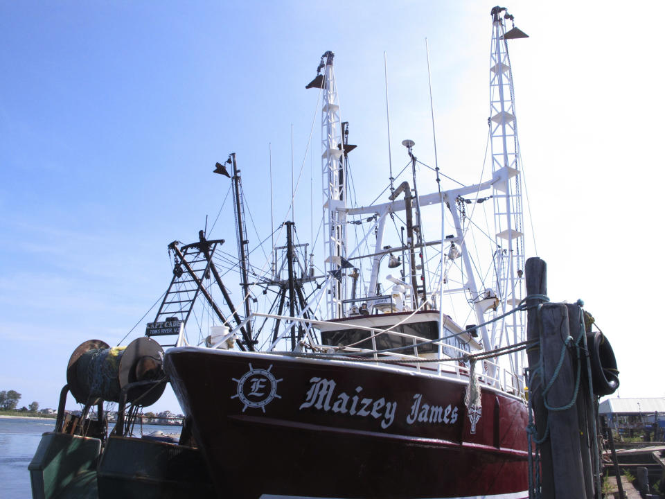 A fishing boat sits at the dock in Point Pleasant Beach, N.J. on Sept. 11, 2019. A report issued March 29, 2023 by two federal marine science agencies and the commercial fishing industry highlighted several potential negative aspects of offshore wind energy development on the fishing industry and called for additional research. (AP Photo/Wayne Parry)