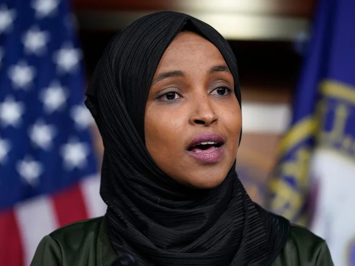 Rep. Ilhan Omar, D-Minn., speaks to reporters in the wake of anti-Islamic comments made last week by Rep. Lauren Boebert, R-Colo., who likened Omar to a bomb-carrying terrorist, during a news conference at the Capitol in Washington, Tuesday, Nov. 30, 2021.