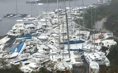 Pleasure craft lie crammed against the shore in Paraquita Bay after Hurricane Irma passed Tortola - Credit: Ron Gurney/Reuters