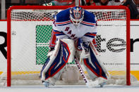 NEWARK, NJ - MAY 25: Henrik Lundqvist #30 of the New York Rangers looks on from goal against the New Jersey Devils in Game Six of the Eastern Conference Final during the 2012 NHL Stanley Cup Playoffs at the Prudential Center on May 25, 2012 in Newark, New Jersey. (Photo by Bruce Bennett/Getty Images)