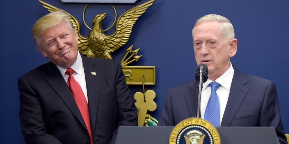 In this Jan. 27, 2017, file photo, U.S. Defense Secretary Jim Mattis, right, speaks as President Donald Trump, left, listens at the Pentagon in Washington.