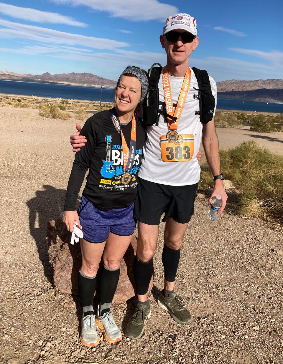 Keith Tindall and wife Donna share a moment prior to the Hoover Dam Marathon in Lake Mead, Nevada, on Dec. 10, 2022.